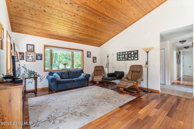 2158 State Route 29, Greenwich, NY 12834 - living room featuring wood finished floors, baseboards, high vaulted ceiling, and wood ceiling