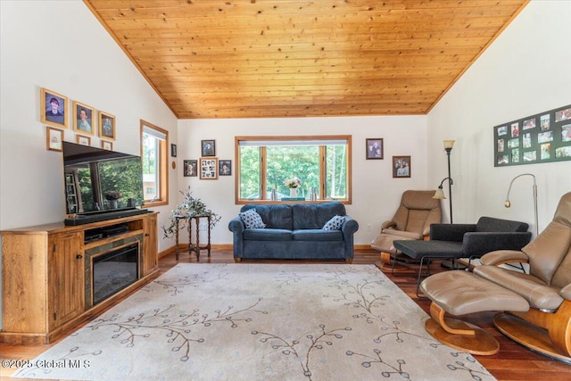 2158 State Route 29, Greenwich, NY 12834 - living room with wood ceiling, wood finished floors, baseboards, high vaulted ceiling, and a glass covered fireplace