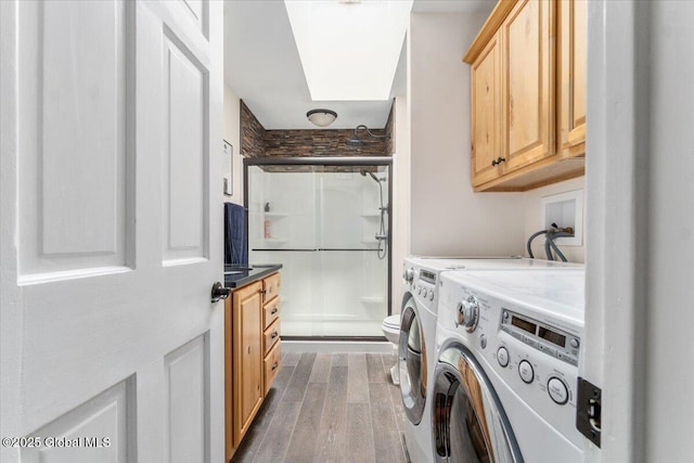2158 State Route 29, Greenwich, NY 12834 - washroom featuring washing machine and clothes dryer and wood finished floors