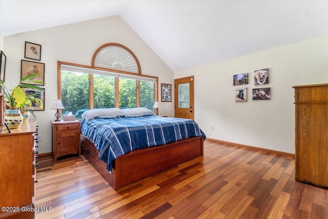 2158 State Route 29, Greenwich, NY 12834 - bedroom featuring light wood-type flooring, high vaulted ceiling, and baseboards