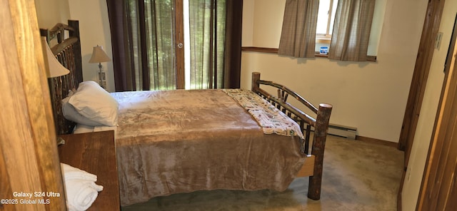 1758 US Route 9, Schroon, NY 12870 - carpeted bedroom featuring baseboards and a baseboard radiator