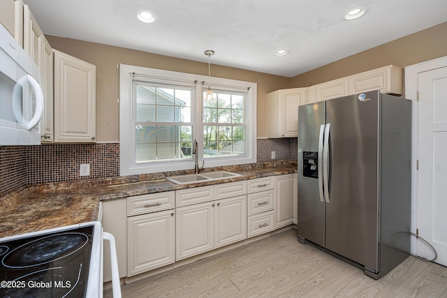 58 Old Loudon Rd, Colonie, NY 12110 - kitchen featuring white appliances, a sink, light wood finished floors, decorative backsplash, and recessed lighting