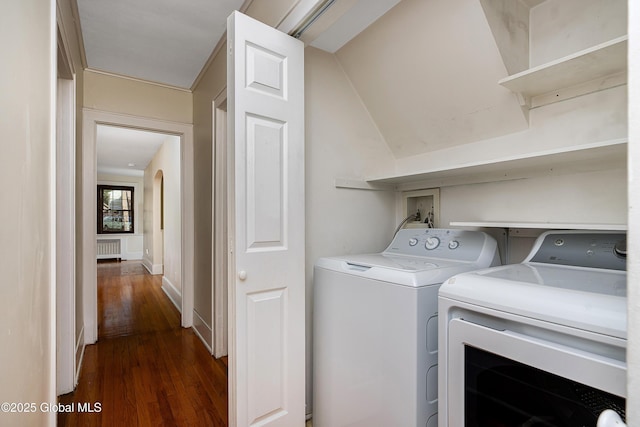 58 Old Loudon Rd, Colonie, NY 12110 - washroom with washing machine and dryer, dark wood finished floors, and radiator heating unit