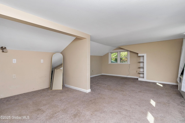 58 Old Loudon Rd, Colonie, NY 12110 - unfurnished living room with lofted ceiling and carpet