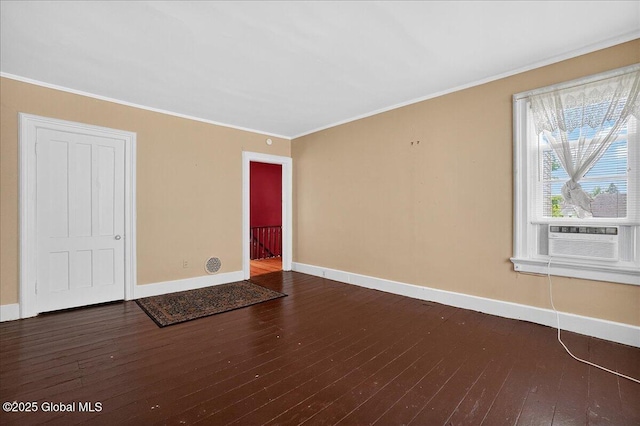 302 S William St, Johnstown, NY 12095 - empty room with hardwood / wood-style floors, cooling unit, and ornamental molding