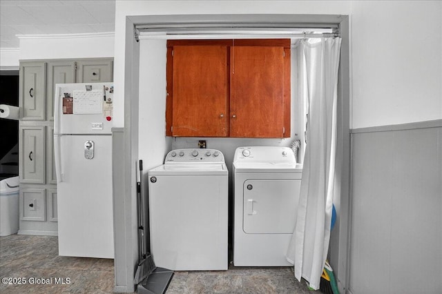 302 S William St, Johnstown, NY 12095 - laundry area featuring cabinet space and washing machine and dryer