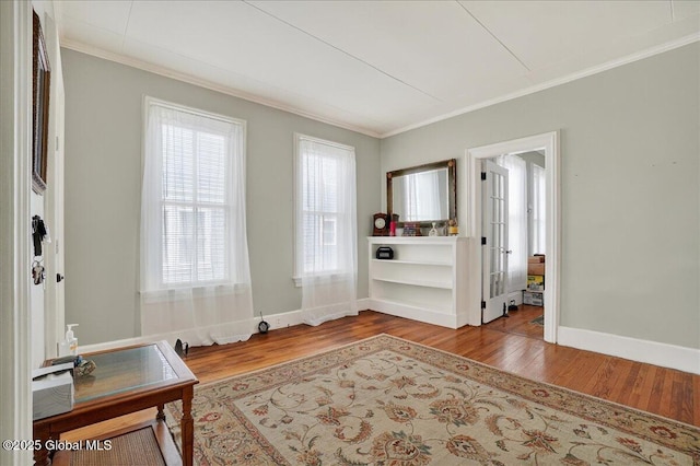 302 S William St, Johnstown, NY 12095 - living area with crown molding and wood finished floors