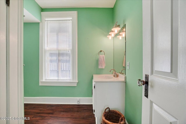 302 S William St, Johnstown, NY 12095 - bathroom with vanity and wood finished floors