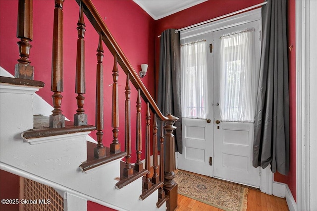 302 S William St, Johnstown, NY 12095 - entrance foyer with stairway, wood finished floors, and french doors
