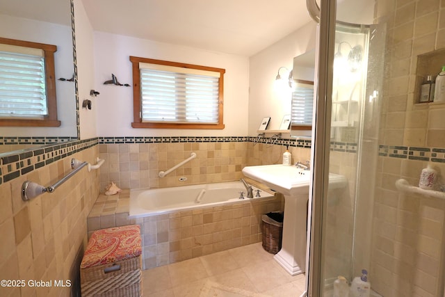 745 Adirondack Rd, Schroon Lake, NY 12870 - full bath with a stall shower, tile patterned floors, a bath, and tile walls