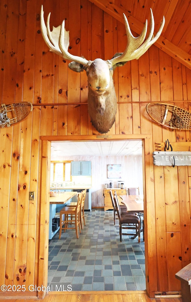 745 Adirondack Rd, Schroon Lake, NY 12870 - dining area featuring wooden walls and high vaulted ceiling