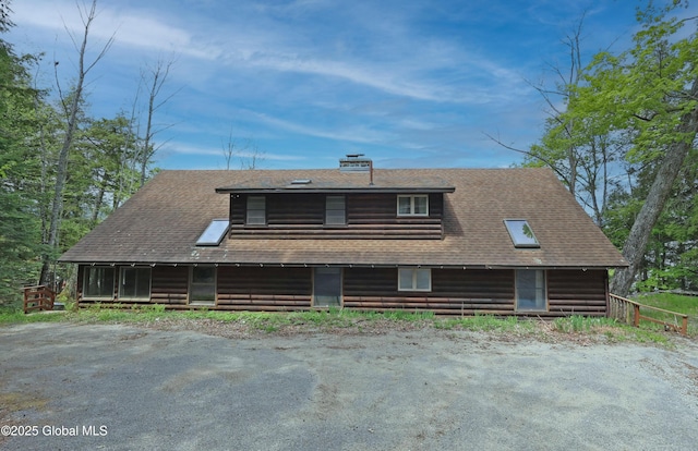 745 Adirondack Rd, Schroon Lake, NY 12870 - log cabin featuring a chimney and roof with shingles