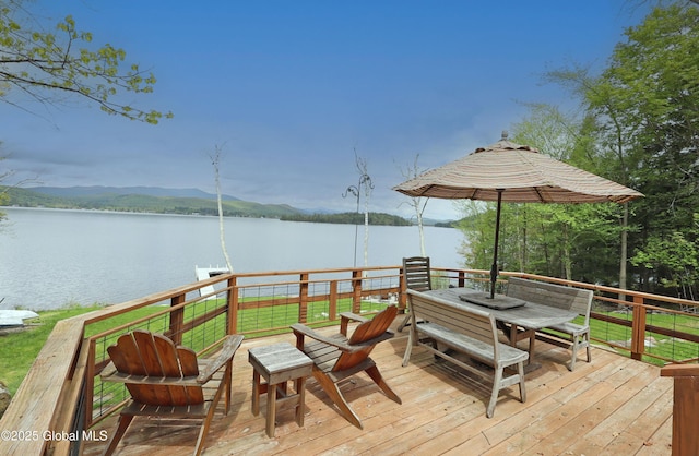745 Adirondack Rd, Schroon Lake, NY 12870 - wooden terrace featuring a water view and outdoor dining space