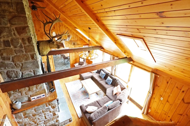 745 Adirondack Rd, Schroon Lake, NY 12870 - living room with wood ceiling, wood finished floors, vaulted ceiling, a skylight, and wood walls