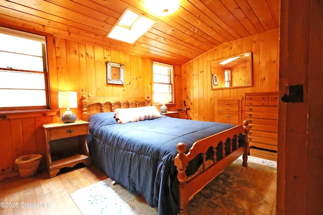 745 Adirondack Rd, Schroon Lake, NY 12870 - bedroom featuring lofted ceiling, wood finished floors, wood ceiling, and wooden walls