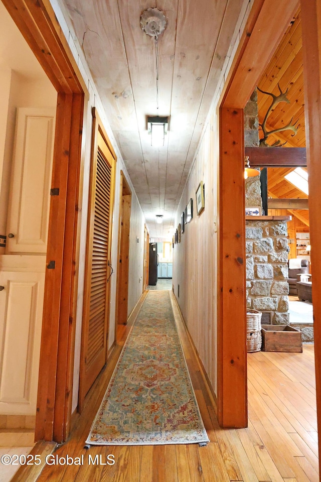 745 Adirondack Rd, Schroon Lake, NY 12870 - hall featuring hardwood / wood-style flooring and wood walls