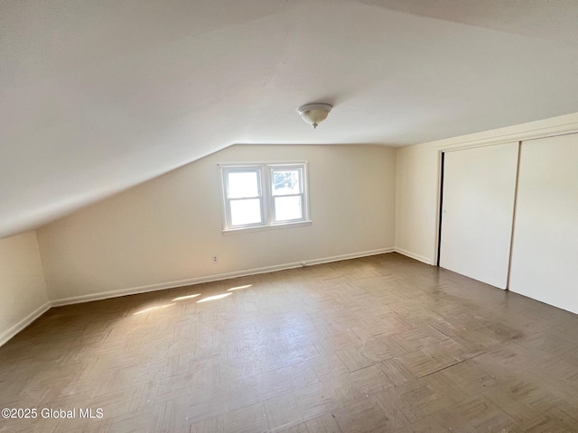 44 Park Ave, Colonie, NY 12110 - additional living space with lofted ceiling and baseboards