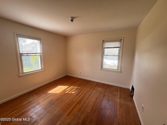 44 Park Ave, Colonie, NY 12110 - empty room featuring wood finished floors and baseboards