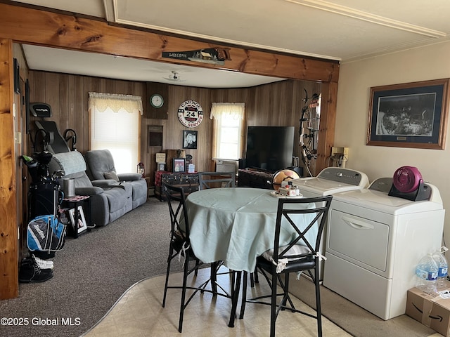 11 Williams St, Granville, NY 12832 - living area featuring wood walls, washer and dryer, and light carpet