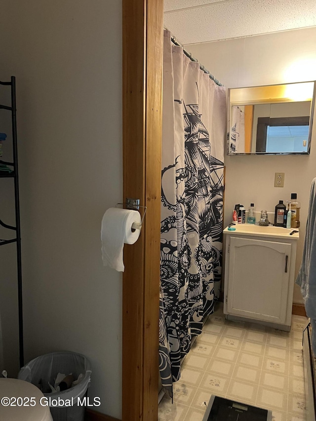 11 Williams St, Granville, NY 12832 - full bath with tile patterned floors, vanity, and a shower with shower curtain