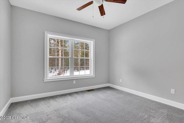 24 Nichols Rd, Wilton, NY 12831 - unfurnished room featuring a ceiling fan, carpet flooring, and baseboards