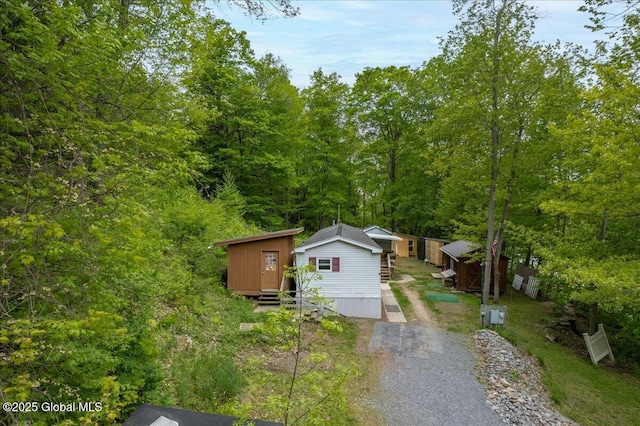 207 State Highway 5s, Florida, NY 12137 - view of yard featuring an outbuilding, a shed, and a wooded view
