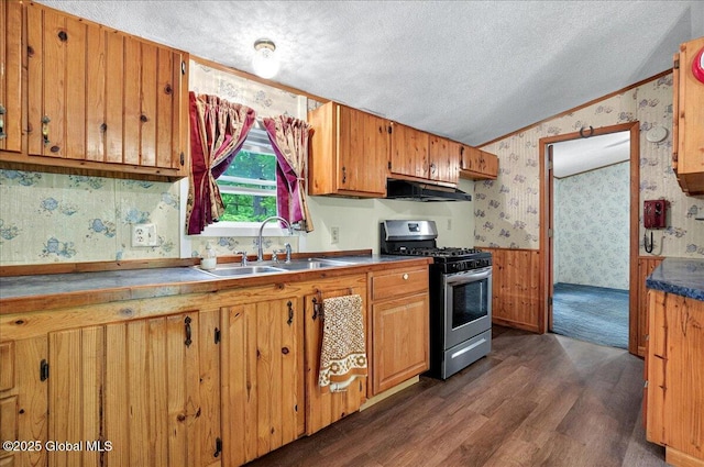 207 State Highway 5s, Florida, NY 12137 - kitchen with stainless steel gas range oven, wallpapered walls, a textured ceiling, under cabinet range hood, and dark wood-style floors