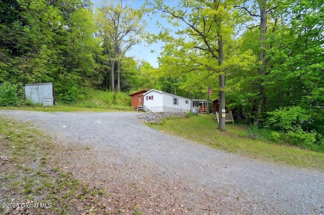 207 State Highway 5s, Florida, NY 12137 - view of front of home featuring a view of trees and driveway