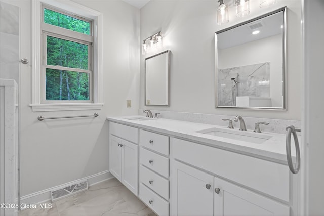 480 Selfridge Rd, Moreau, NY 12831 - full bathroom with double vanity, marble finish flooring, and a marble finish shower