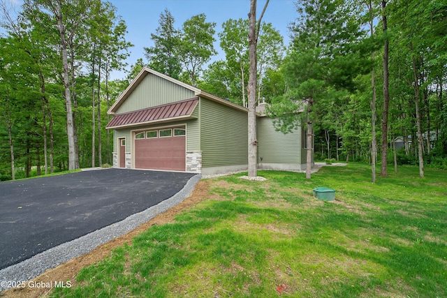 480 Selfridge Rd, Moreau, NY 12831 - view of front of home featuring a front yard, a metal roof, a standing seam roof, and stone siding
