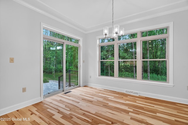 480 Selfridge Rd, Moreau, NY 12831 - spare room with a chandelier, light wood-style flooring, and ornamental molding