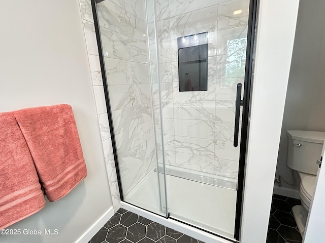 354 Mohawk Ave, Scotia, NY 12302 - bathroom with baseboards, toilet, and a stall shower