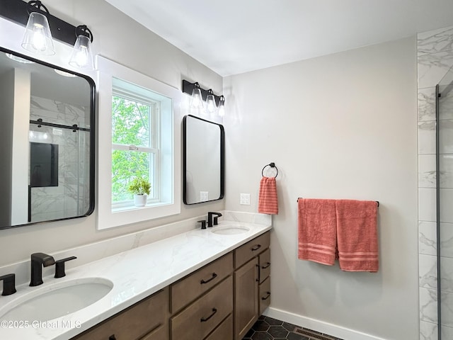 354 Mohawk Ave, Scotia, NY 12302 - full bath with double vanity, a stall shower, tile patterned flooring, and baseboards