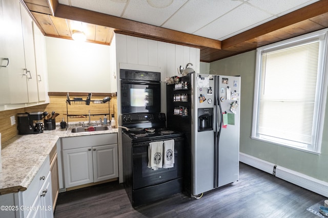 1356 W High St, Ballston Spa, NY 12020 - kitchen with a sink, black appliances, dark wood-type flooring, a baseboard radiator, and light countertops