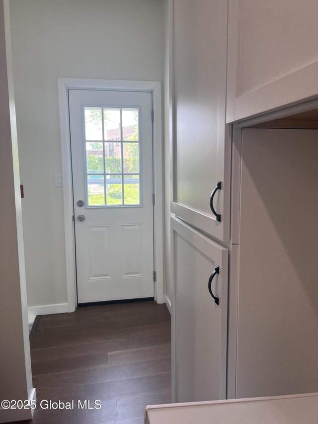 32 Old Sparrowbush Rd, Colonie, NY 12110 - entryway with dark wood finished floors and baseboards