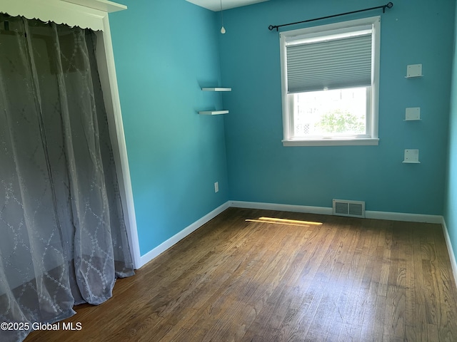 32 Old Sparrowbush Rd, Colonie, NY 12110 - empty room featuring wood finished floors and baseboards