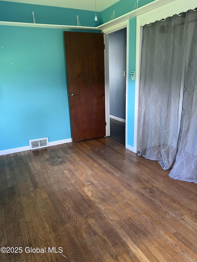32 Old Sparrowbush Rd, Colonie, NY 12110 - empty room featuring wood finished floors and baseboards