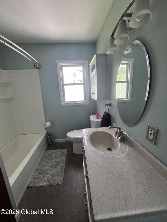 32 Old Sparrowbush Rd, Colonie, NY 12110 - bathroom with plenty of natural light, toilet, vanity, and tub / shower combination