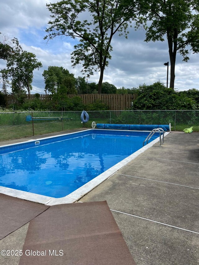 32 Old Sparrowbush Rd, Colonie, NY 12110 - view of swimming pool with a patio area