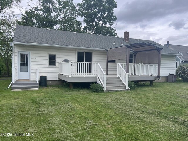 32 Old Sparrowbush Rd, Colonie, NY 12110 - back of house with a deck, a pergola, a chimney, roof with shingles, and a lawn