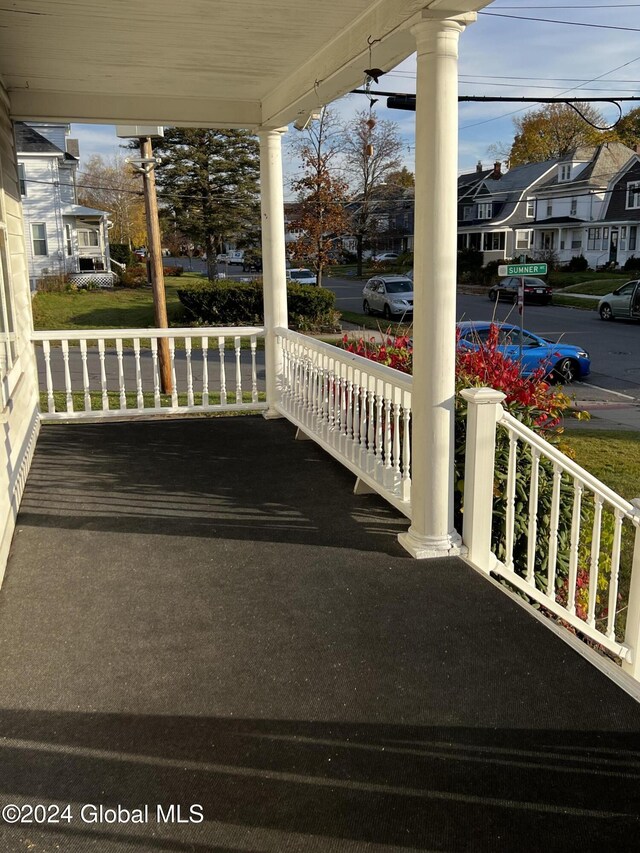 1643 Rugby Rd, Schenectady, NY 12309 - view of patio featuring covered porch and a residential view