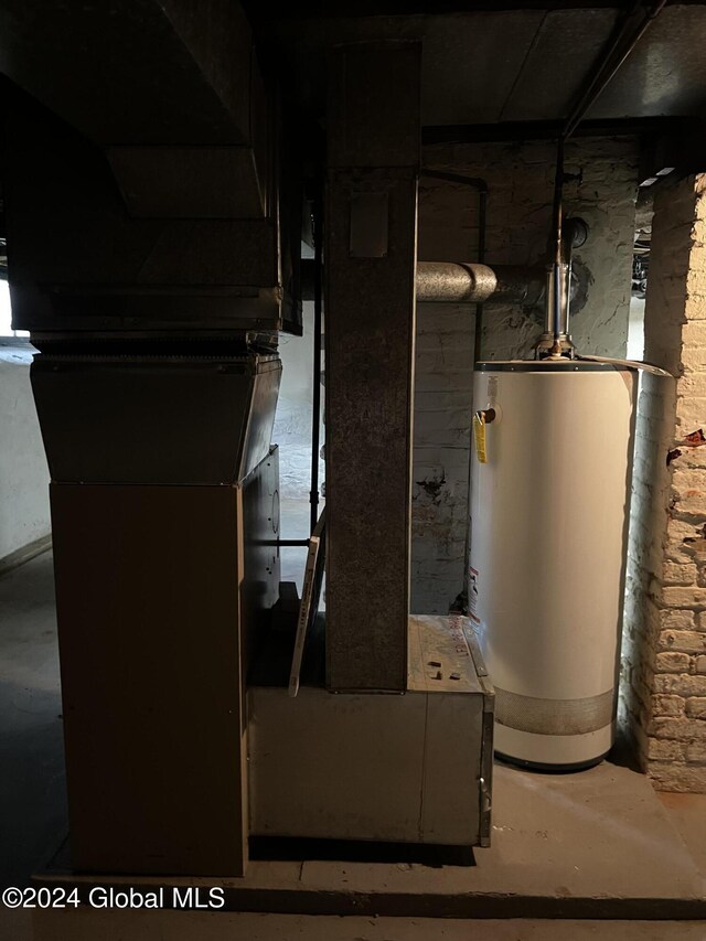 1643 Rugby Rd, Schenectady, NY 12309 - utility room with water heater