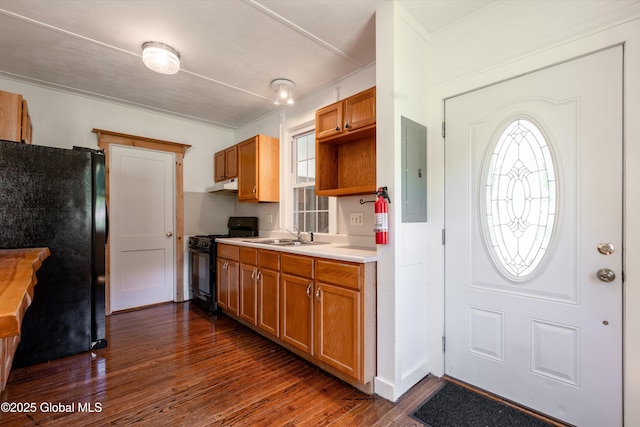 1301 State Route 313, Cambridge, NY 12816 - kitchen featuring black appliances, under cabinet range hood, dark wood-style floors, electric panel, and a sink