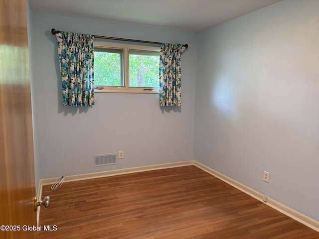 3 State Cir, Gloversville, NY 12078 - spare room with wood finished floors and baseboards