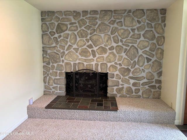 3 State Cir, Gloversville, NY 12078 - detailed view of carpet, a fireplace, and baseboards
