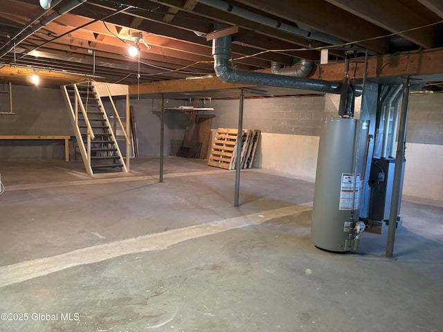 3 State Cir, Gloversville, NY 12078 - unfinished below grade area featuring gas water heater and stairs