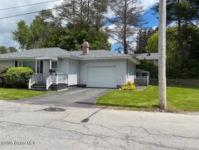 3 State Cir, Gloversville, NY 12078 - ranch-style home with a garage, asphalt driveway, a front yard, and a chimney