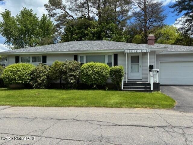 3 State Cir, Gloversville, NY 12078 - ranch-style house featuring an attached garage, a chimney, a front lawn, and driveway