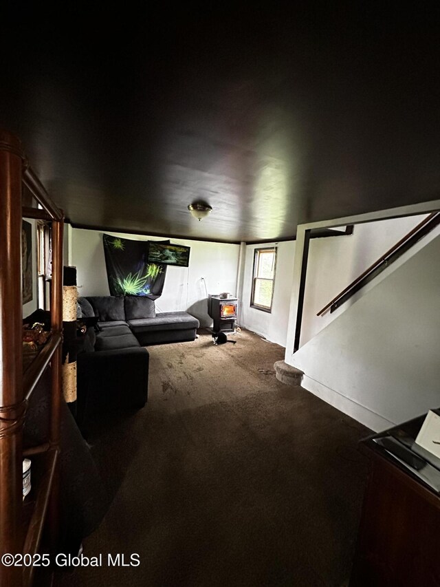 503 N Main St, Gloversville, NY 12078 - carpeted living room featuring stairs