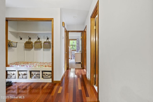 6175 Hawes Rd, Guilderland, NY 12009 - mudroom featuring wood finished floors and baseboards